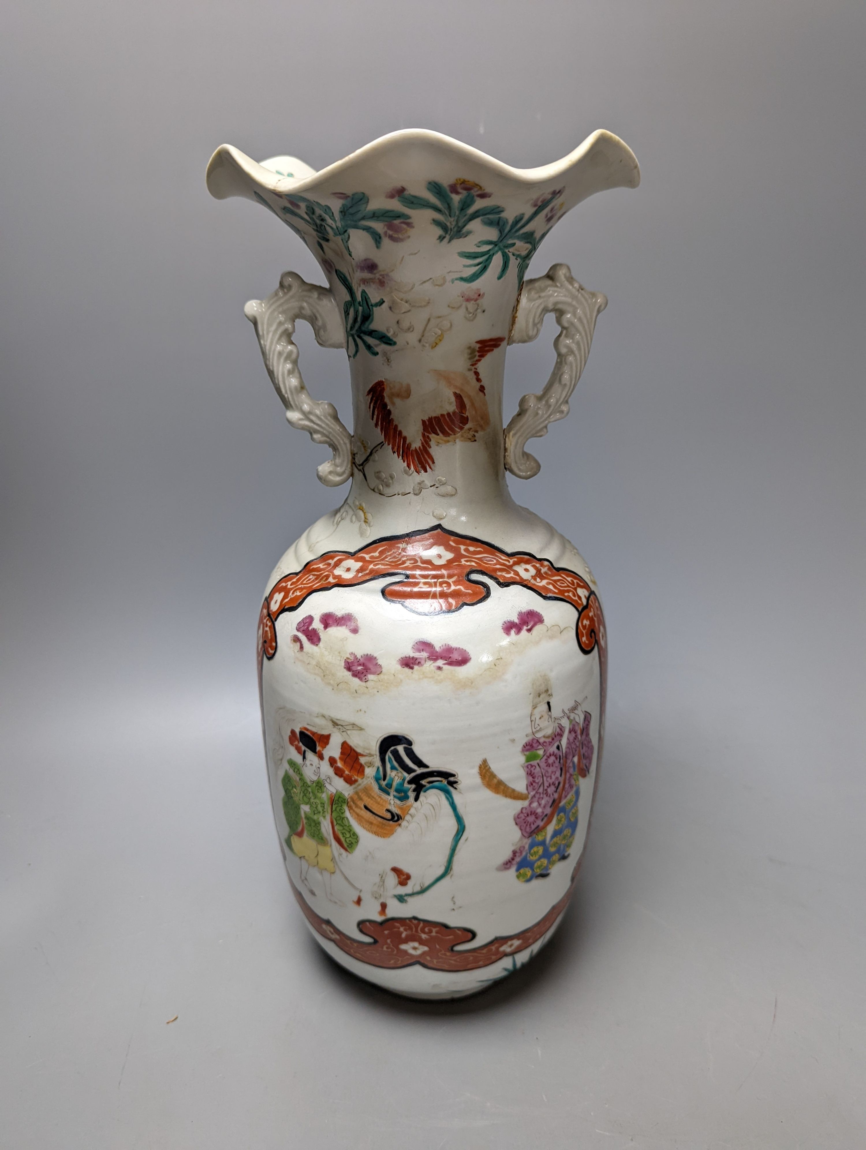 A Chinese famille rose vase and two ginger jars, together with a Japanese vase, 38cm